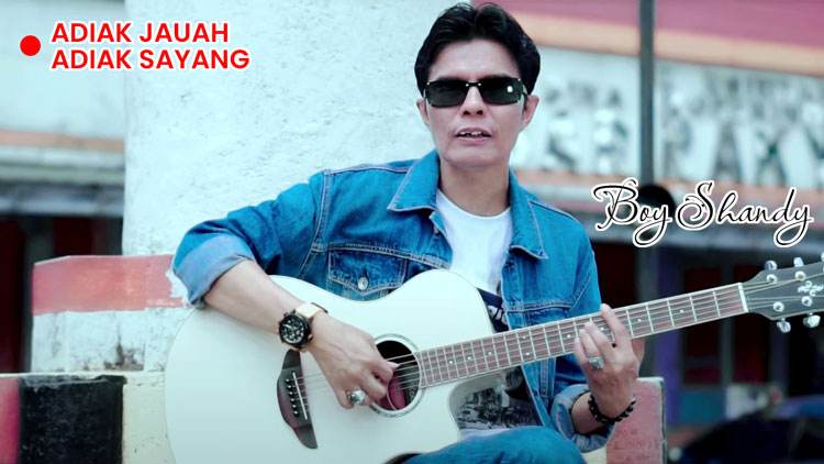 Gambar ilustratif yang menggambarkan inti berita tentang Chord Lagu Adiak Jauah Adiak Sayang, lirik lagu Adiak Jauah Adiak Sayang, lagu Boy Shandy.