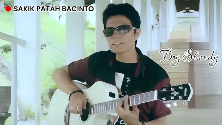 Gambar eksklusif yang menyoroti fenomena Chord Lagu Sakik Patah Bacinto, lirik lagu Sakik Patah Bacinto, lagu Boy Shandy.