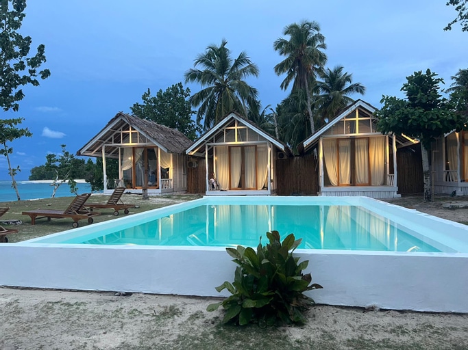 Visualisasi yang menunjukkan dampak langsung dari peristiwa La Belle Hollow Trees: Tempat Menginap Ideal Untuk Pecinta Surfing.
