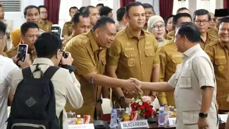 Infografis yang memberikan ringkasan fakta utama tentang Rakor Rehabilitasi dan Rekonstruksi,Wali Kota Pariaman Yota Balad.